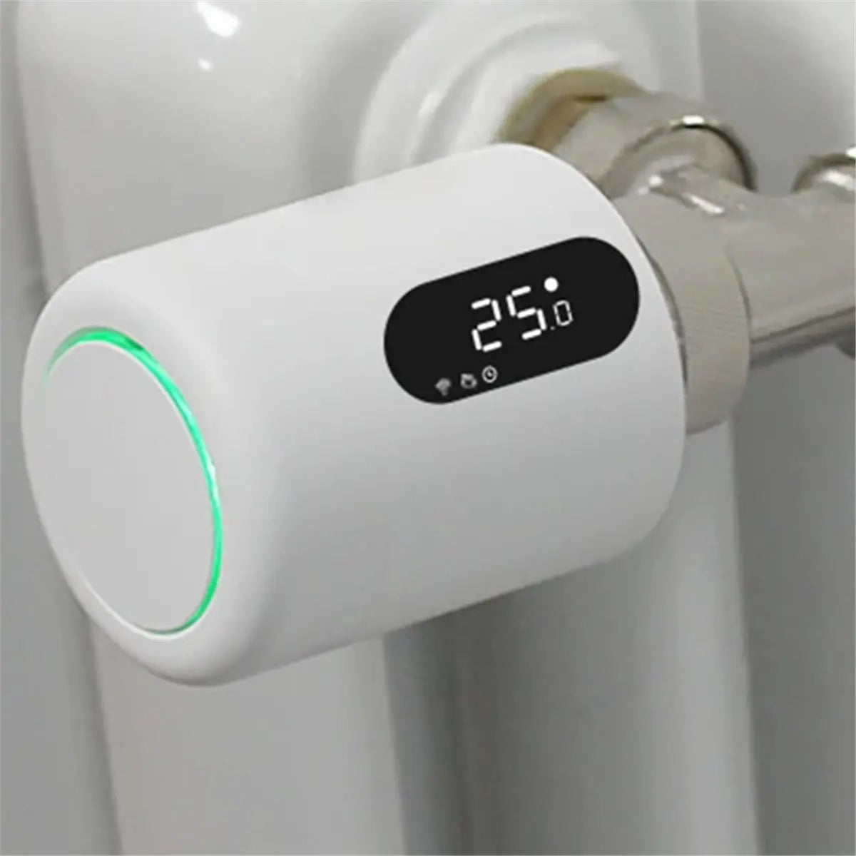 Zigbee Smart Gateway Hub for Smart Home Automation displaying temperature on a white device connected to a radiator.